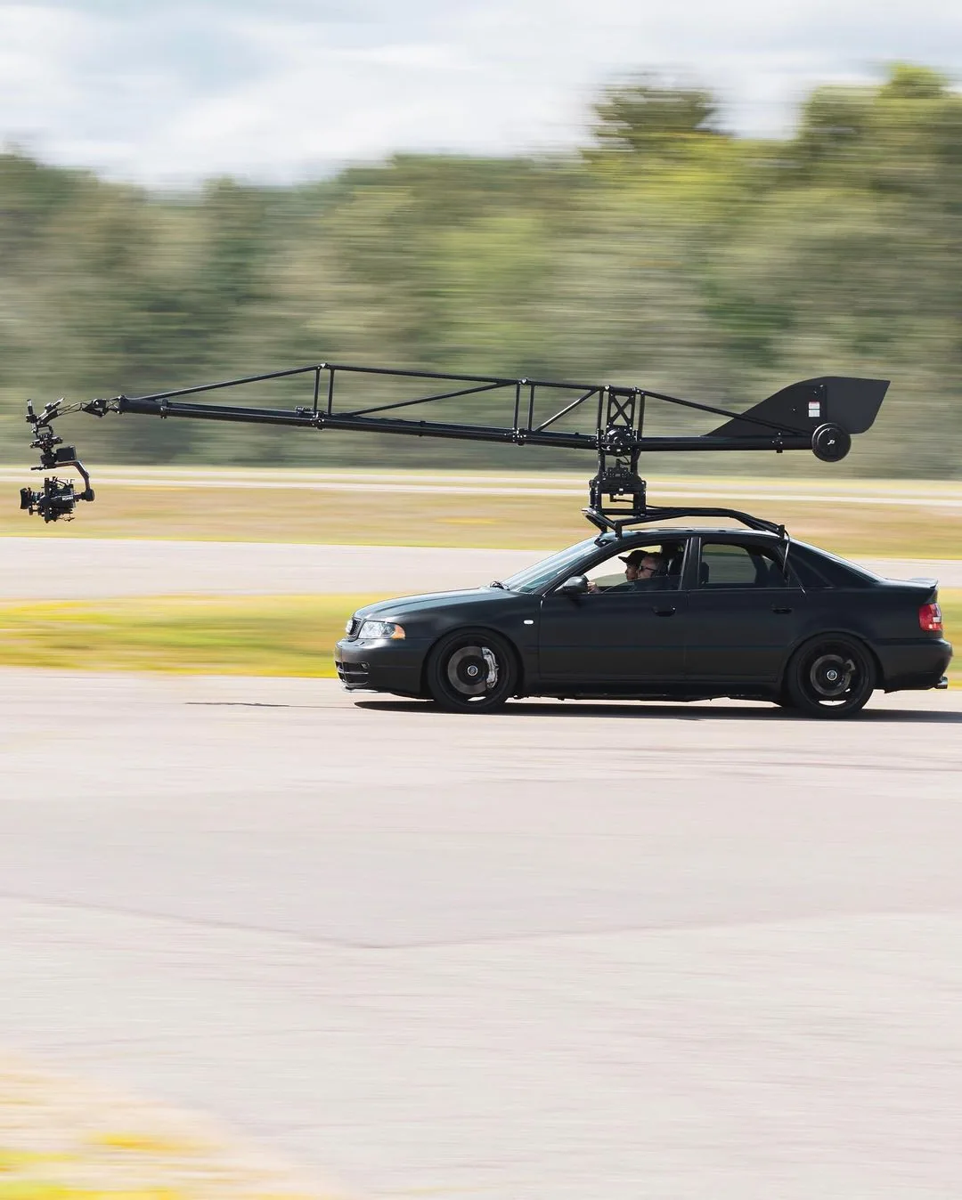 Camera car in motion capturing a tracking shot